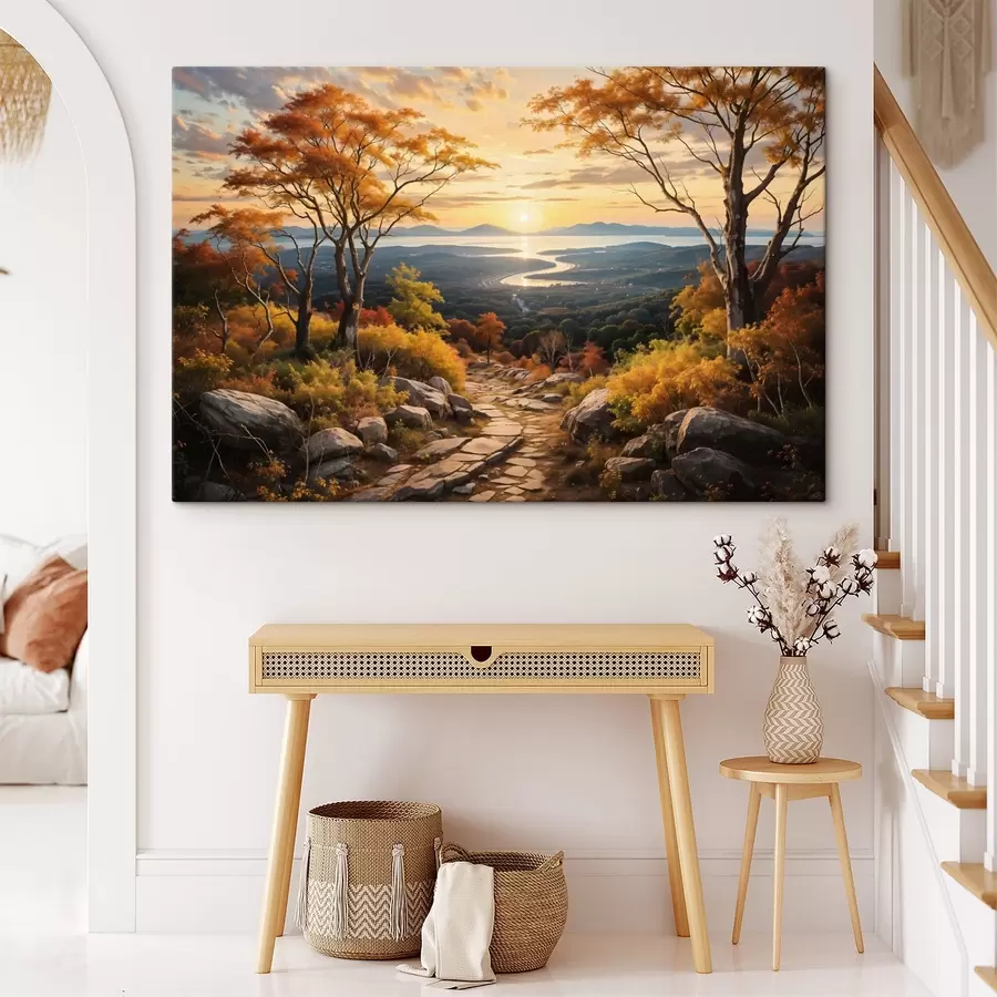 murales de pared Paisaje con un sinuoso camino de tierra que atraviesa un bosque de árboles de colores otoñales y un cielo al atardecer s41732