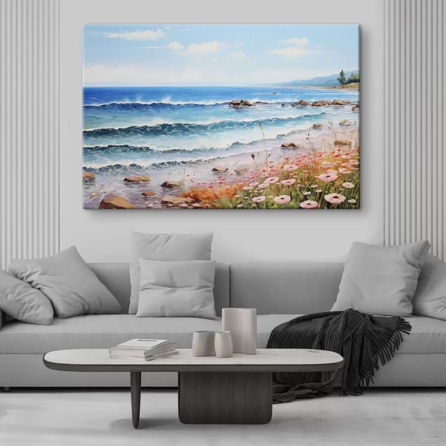 murales de pared Una vista junto al mar con olas turquesas, una playa de guijarros y delicadas flores rosas en primer plano bajo un cielo luminoso. s42569