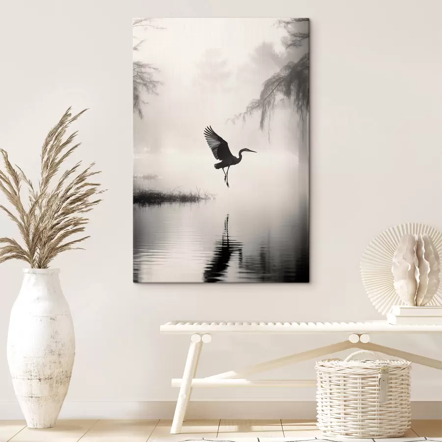 murales de pared Una garza blanca con las alas extendidas, volando cerca de altos juncos, composición minimalista en blanco y negro. s46694