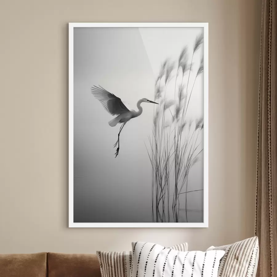 murales de pared Una garza blanca con las alas extendidas, volando cerca de altos juncos, composición minimalista en blanco y negro. f46693