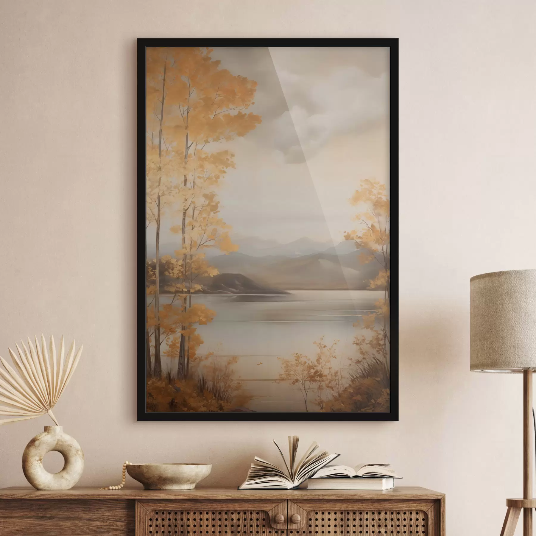 murales de pared Árboles otoñales con hojas anaranjadas enmarcan un lago tranquilo con montañas lejanas bajo un cielo nublado. f47441